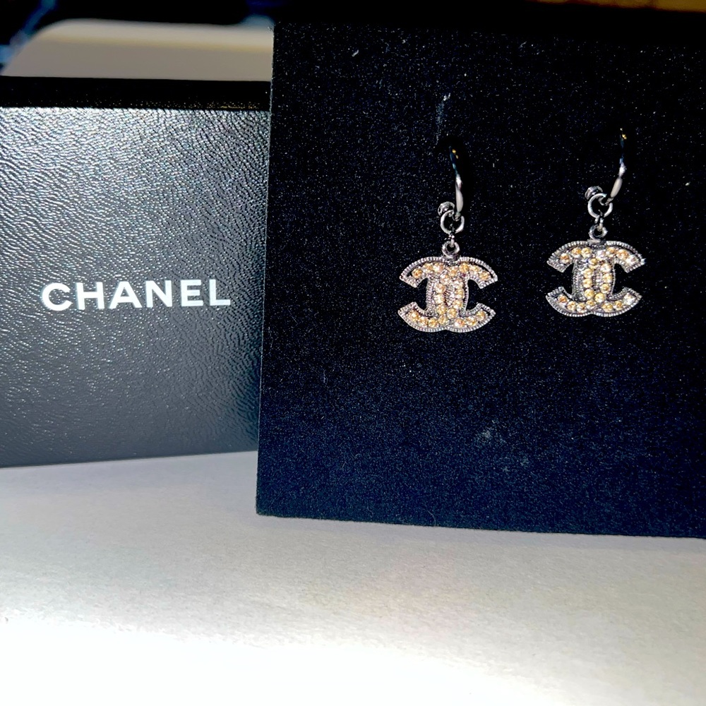 Stunning authentic CC Logo rhinestone post earrings.